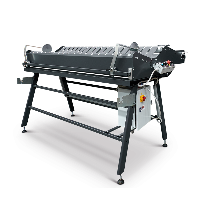 FK Group Feeding Cradle advancing fabric tension-free to a cutter, supplied by Magnum India