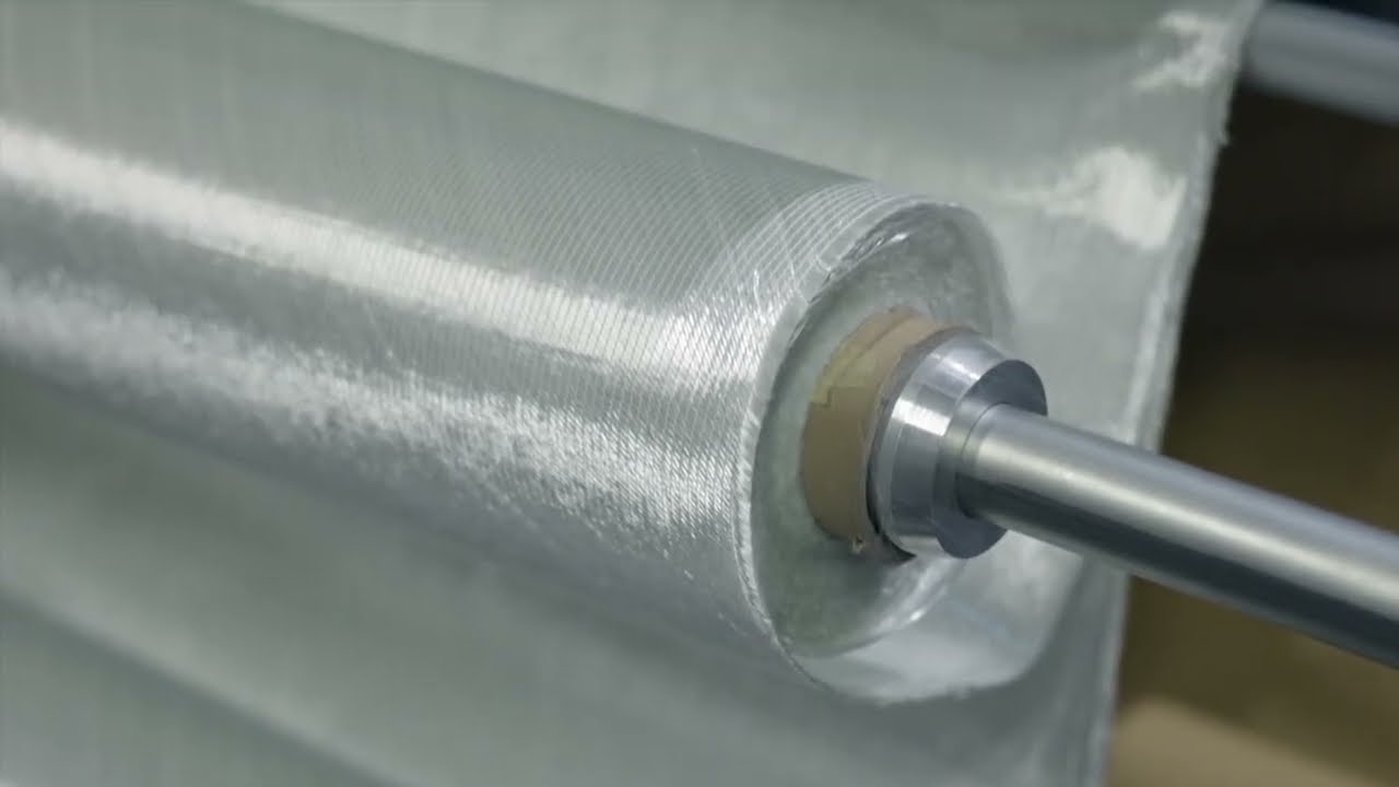 FK Group Multi-Roll Feeder feeding fabric into a cutting line, supplied by Magnum India